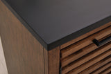 Close-up of warm brown and matte black finish on Kallari credenza
