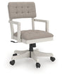Robbinsdale antique white upholstered home office desk chair front angled view