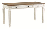 Realyn desk lifted to standing position showing spacious surface