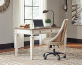 Realyn desk close-up of two-tone finish with distressed wood top