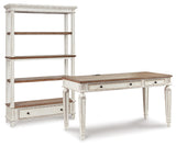 Realyn desk angled view showcasing drawer fronts and tapered legs