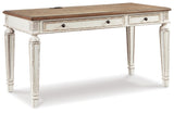 Side view of Realyn desk with decorative corbels