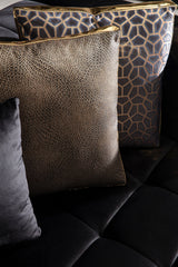 Side angle of Amelia black velvet sectional sofa