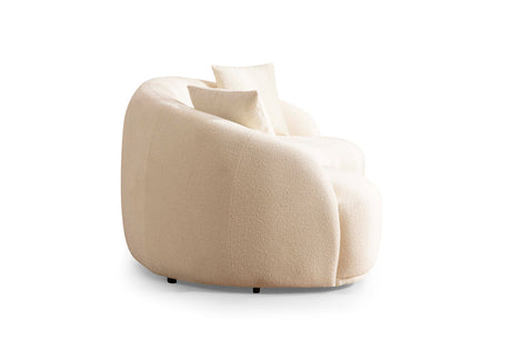 Side angle showing sofa legs and upholstery texture