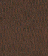 Close-up of brown upholstery and black metal legs on armchair