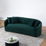 close-up detail of the green velvet upholstery on Cicily sofa