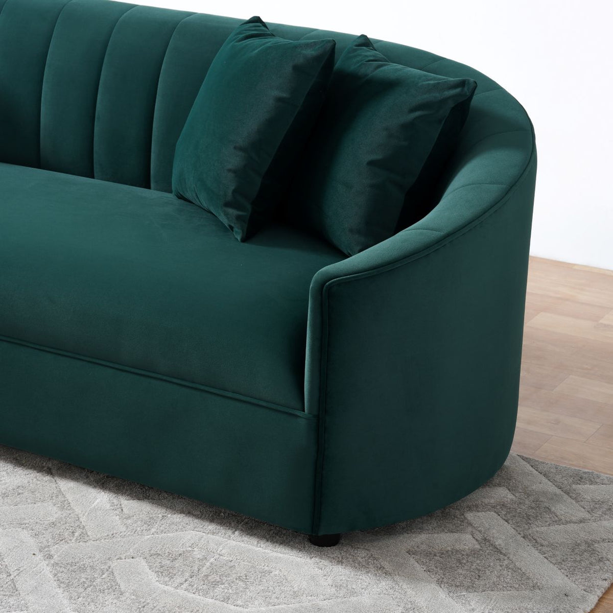 side view showcasing sofa's arm and fabric texture