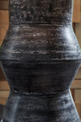 Distressed black rubbed finish close-up on lamp base