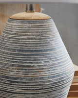 Close-up of Lawrock lamp base with natural wood accents and antique blue terra cotta