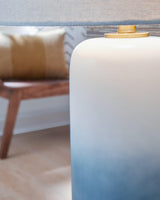 Side view of Lemrich table lamp highlighting color gradation and design