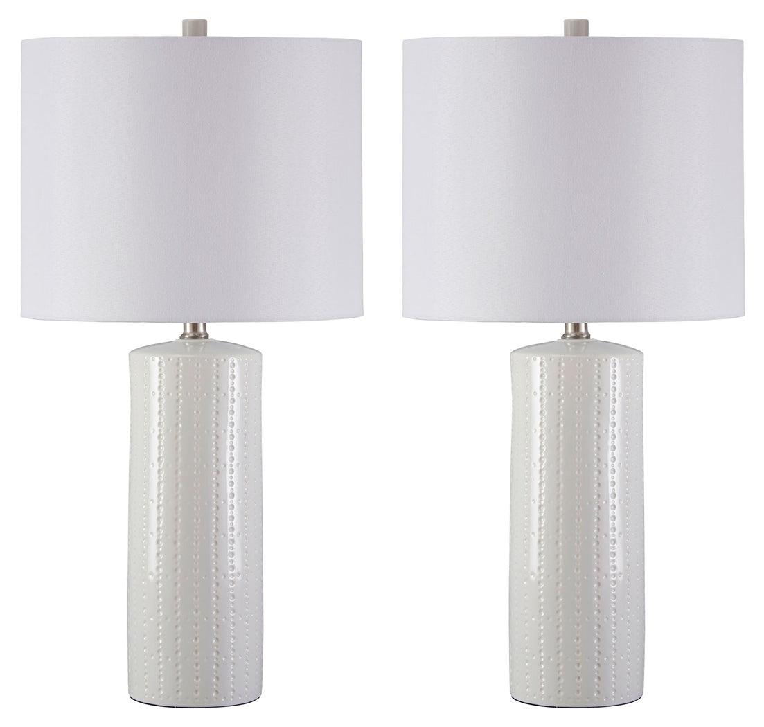 Pair of Steuben white ceramic table lamps on side table