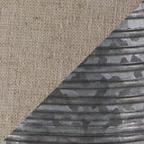 Close-up of Norbert gray metal lamp base with ribbed texture