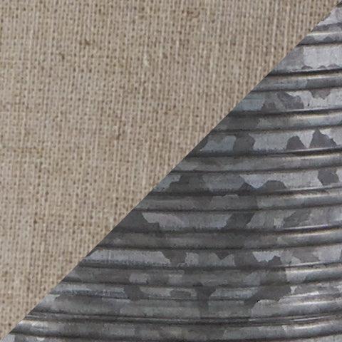 Close-up of Norbert gray metal lamp base with ribbed texture