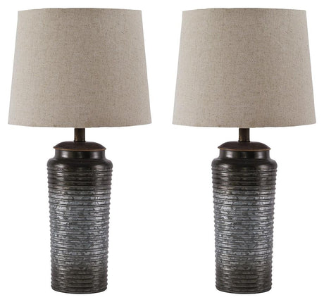 Norbert Gray table lamps shown next to sofa in casual room