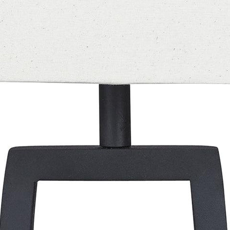Close-up of Makara Table Lamp black metal and brown wood finish