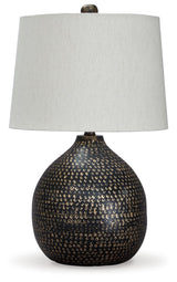 Close-up of Maire table lamp goldtone circular pattern