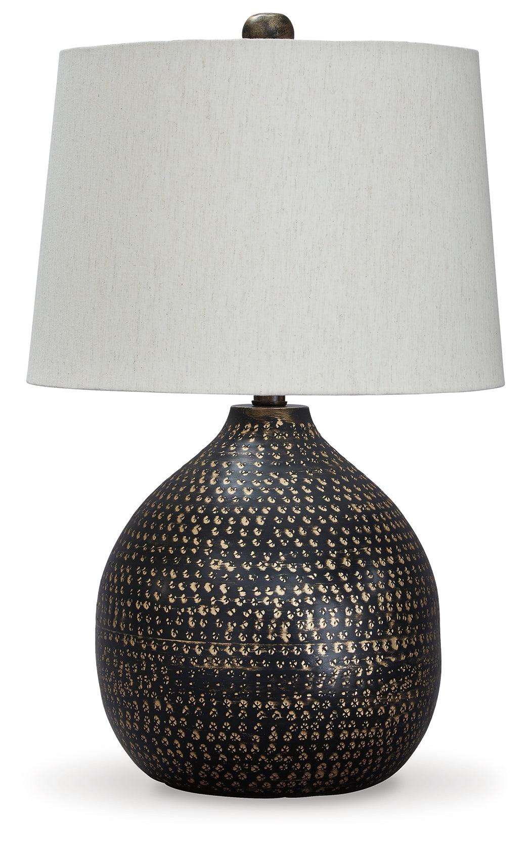 Close-up of Maire table lamp goldtone circular pattern