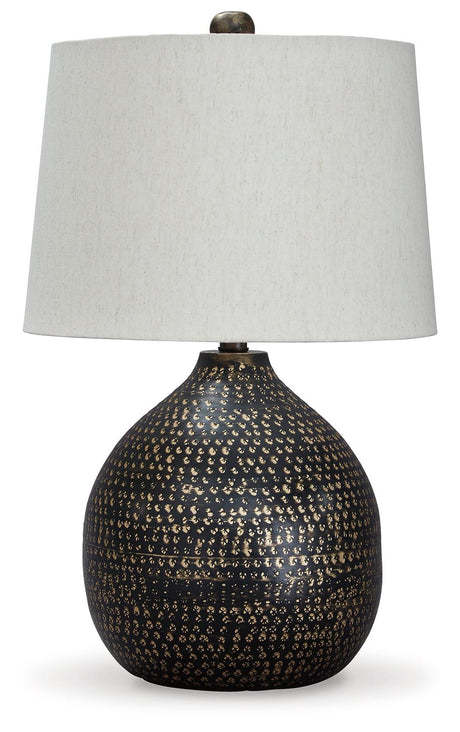 Close-up of Maire table lamp goldtone circular pattern