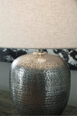 Detail of hammered aluminum texture on Magalie Table Lamp base