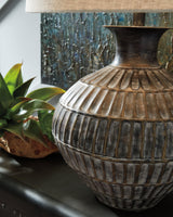 Close-up of antique bronze finish and fabric shade texture