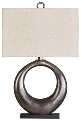 Close-up of Saria Lamp’s antique silver finish curved base