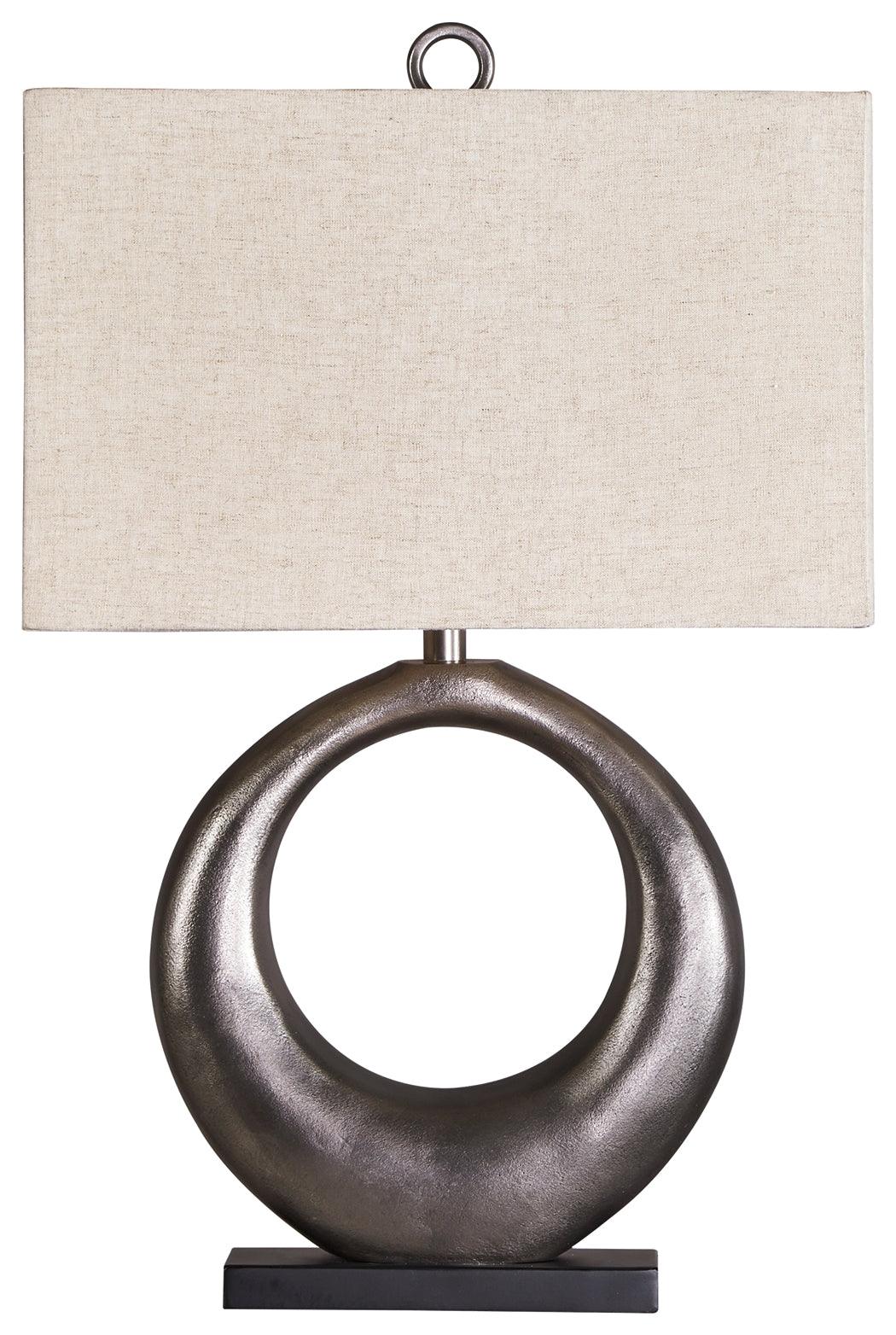 Close-up of Saria Lamp’s antique silver finish curved base