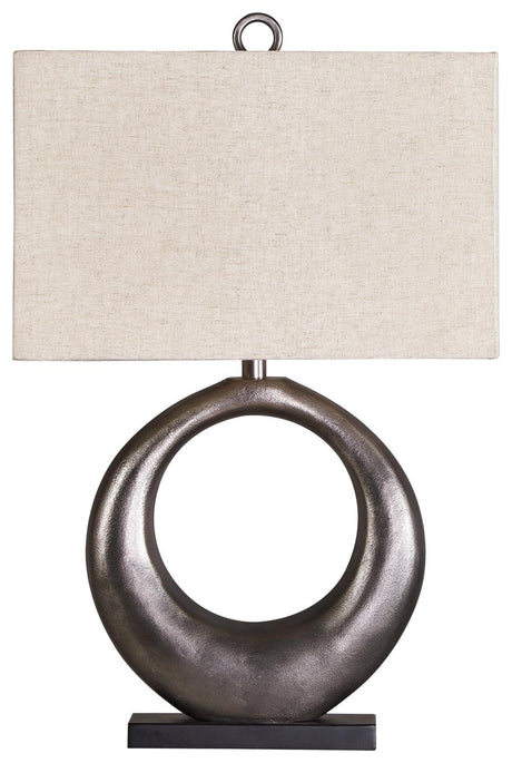 Close-up of Saria Lamp’s antique silver finish curved base