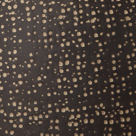 Close detail of Hambell lamp finish showing black and gold tones