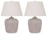 Side angle of one lamp showing distressed cream finish