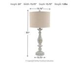 Bernadate table lamp with shade illuminated