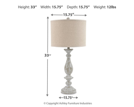 Bernadate table lamp with shade illuminated