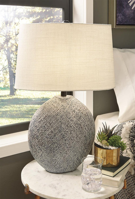 Harif Beige Table Lamp side view showing ceramic base and fabric shade