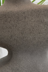 Close-up of distressed black finish on lamp base