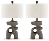 Distressed black lamp with oval shade side angle