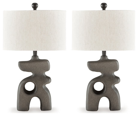 Distressed black lamp with oval shade side angle
