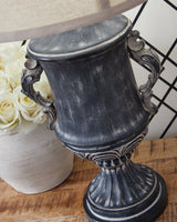 Close-up of Morvanford lamp ornate scroll base