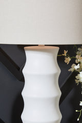 Detail of white fabric drum shade on Veraleigh lamp