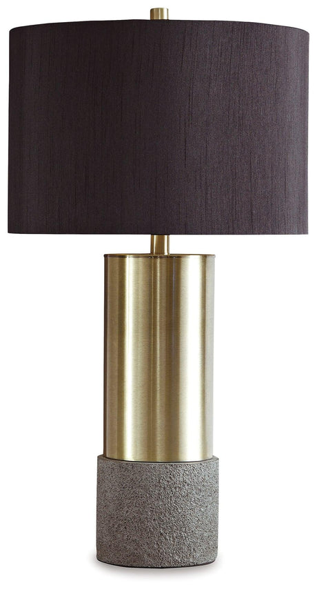 Close-up of Jacek table lamp base showing gray faux concrete texture and brass accents