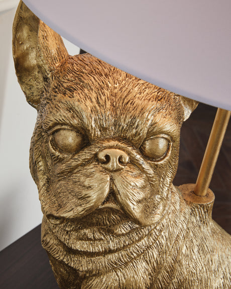 Close-up of the fabric drum shade on Wadeland gold finish lamp