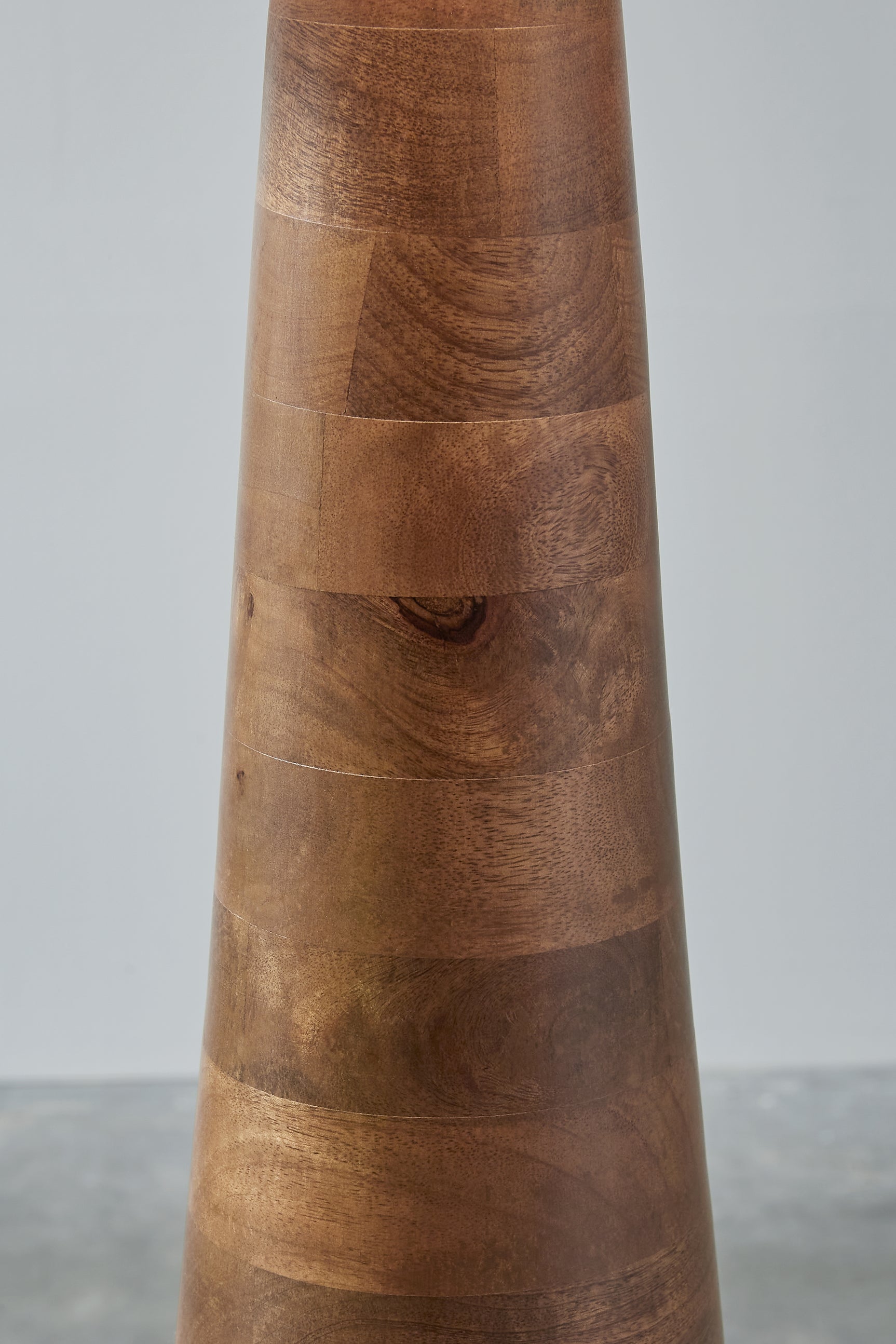 Detail of lamp hardware and wood base finish