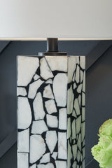 Detail of white marble mosaic pattern on lamp base