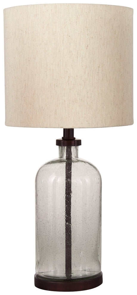Side view of Bandile bronze finish table lamp with fabric drum shade