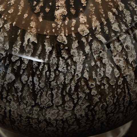 Antique black metal accents on Tenslow lamp