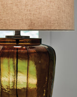 Close-up of the amber glass base and metal details on Bainmore lamp