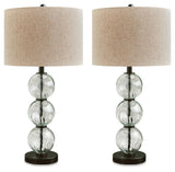 Side view of Airbal clear glass and black base table lamp