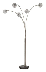 Winter Silver Finish Arc Lamp illuminated in room setting