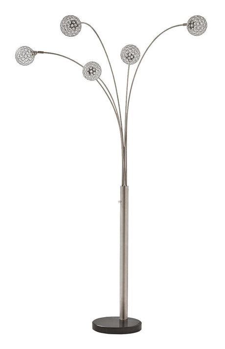 Winter Silver Finish Arc Lamp illuminated in room setting