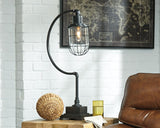 Jae Antique Black Desk Lamp lit for study