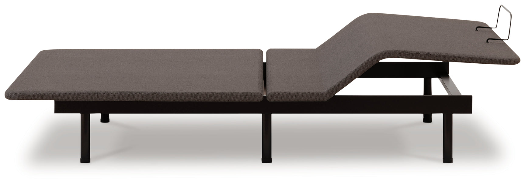 Side view with footrest elevated on charcoal gray adjustable base