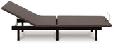 Side view showing head raised on charcoal gray adjustable base